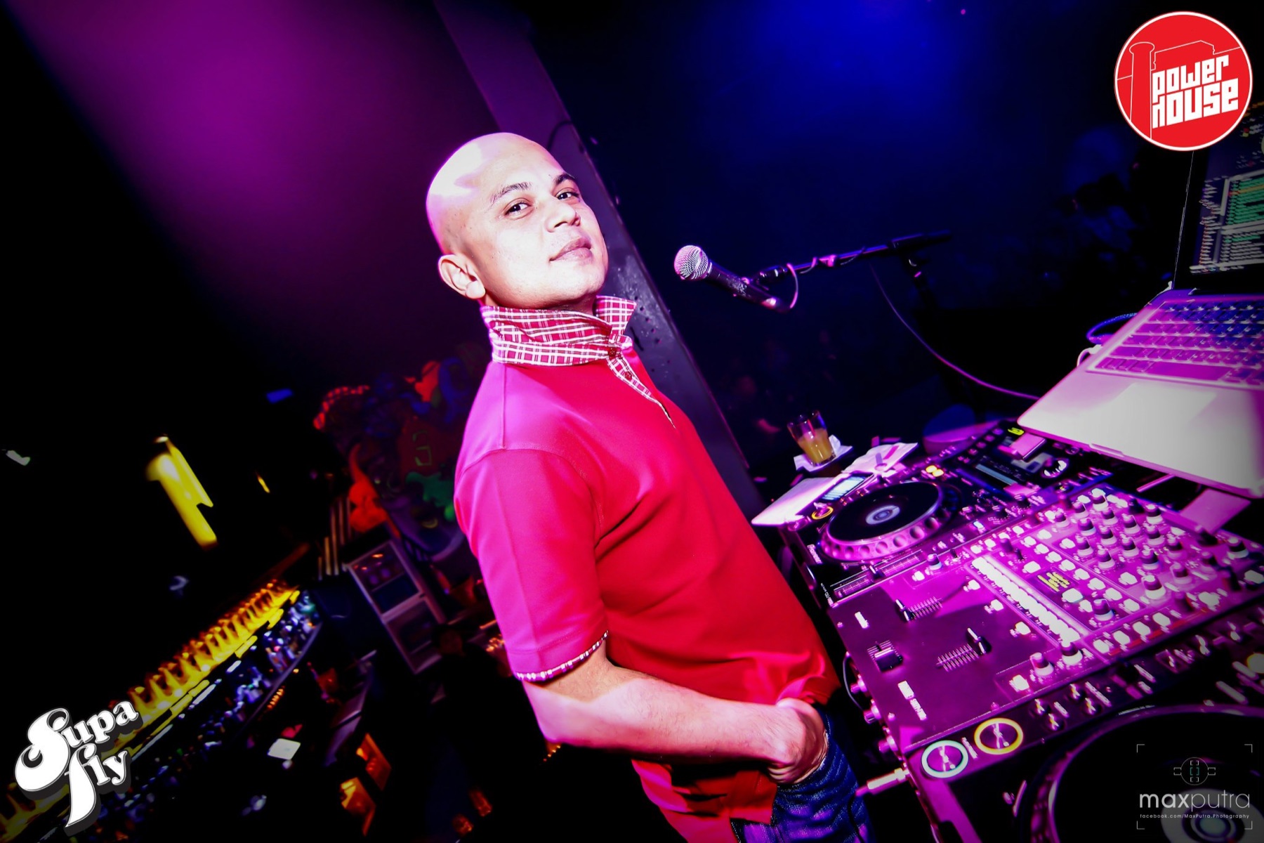 DJ Kzee performing at the decks during the Powerhouse era